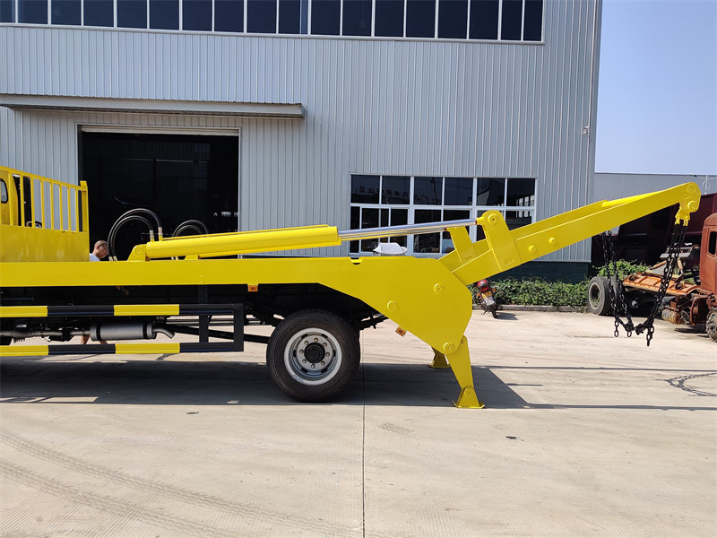 HOWO 4cbm swing arm refuse truck